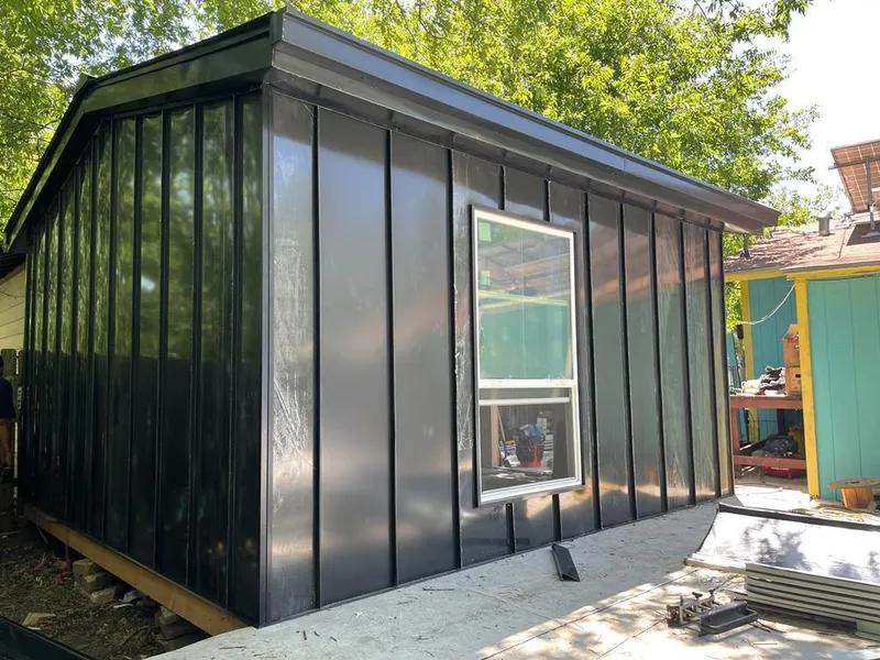 Black standing seam metal wall panels for Roof Inspection in Seymour