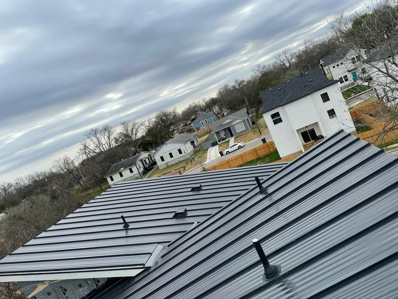 Standing seam metal roof panels with vents for Skylight Repair in Seymour